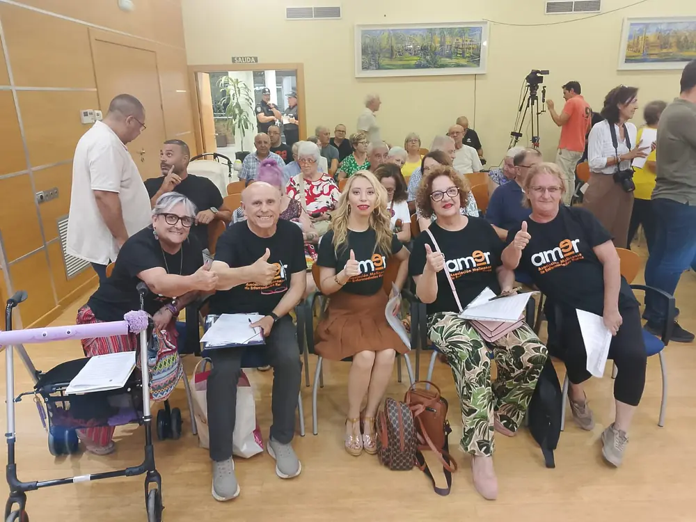 Integrantes de AMER durante el Pleno municipal de Molina de Segura