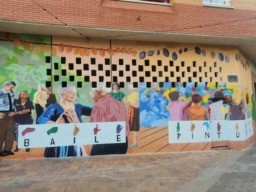 baile y pintura mural vidas coloridas barrio san roque